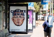 ‘Bushfire brandalism’: Australian artists replace bus shelter ads with political posters