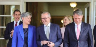 Government exits amid shredding snowstorm, Labor ministers make staged entry