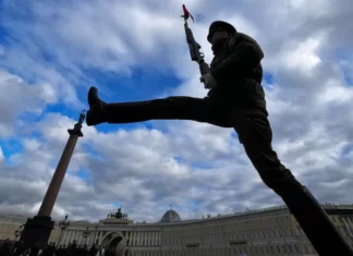 On a Victory Day without victory, Putin faces choice over all-out war